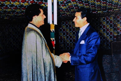Chairman Kamel Ghribi; Muammar al-Gaddafi, Brotherly Leader and Guide of the Revolution of Libya.