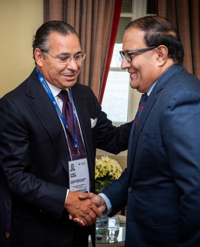 Chairman Kamel Ghribi; S. Iswaran, Minister for Communications and Information, Singapore.