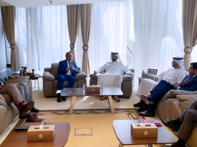 Chairman Kamel Ghribi with H.E. Abdulla Bin Touq Al Marri, Minister of Economy, UAE