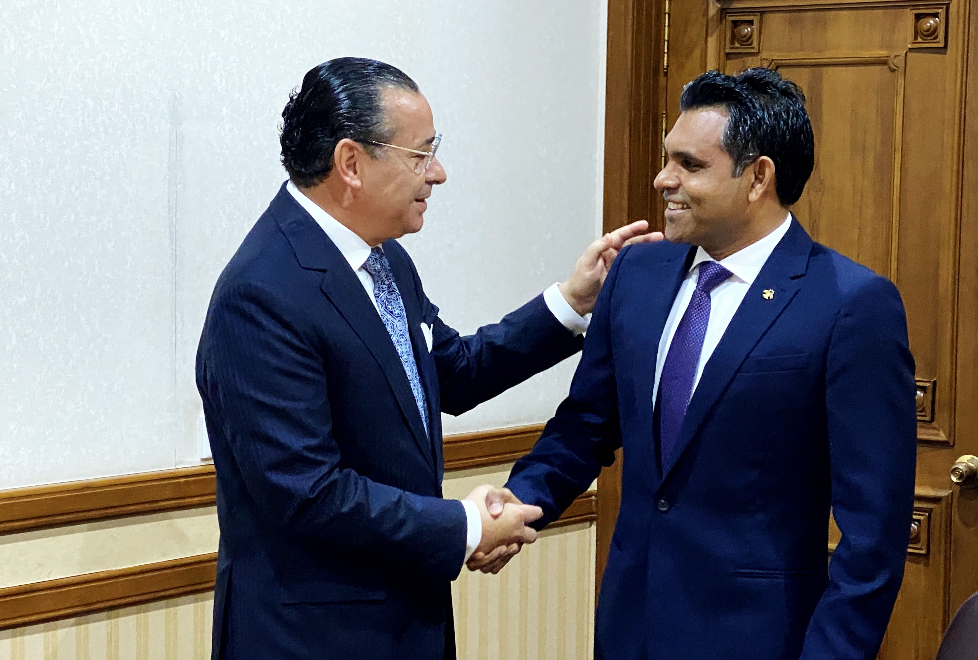 Chairman Kamel Ghribi; Faisal Naseem Vice President of the Republic of the Maldives.