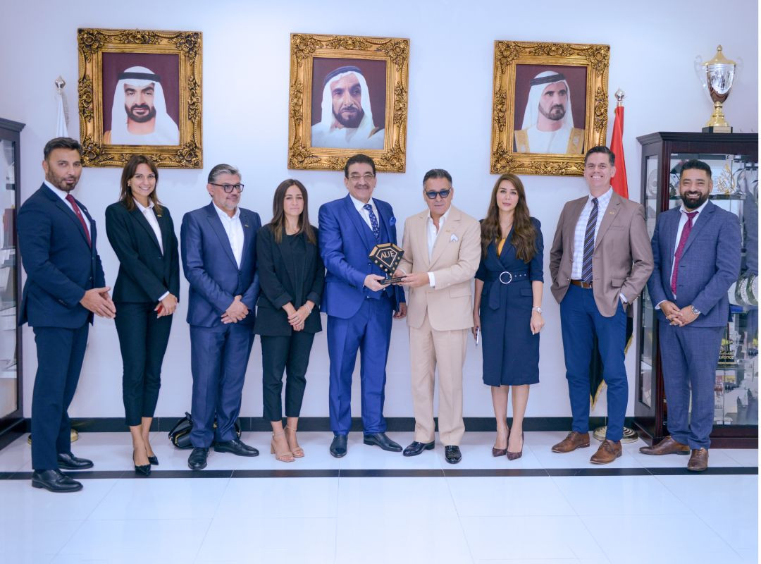 Chairman Kamel Ghribi with Prof. Muthanna Abdul Razzaq, President the American University in UAE.