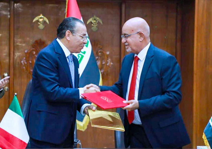 Chairmain Kamel Ghribi with Salih Al-Hasnawi, Minister of Health of Iraq.