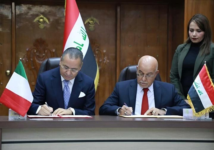 Chairmain Kamel Ghribi with Salih Al-Hasnawi, Minister of Health of Iraq.